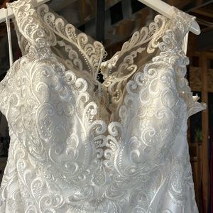 Allure romance illusion back lace wedding gown